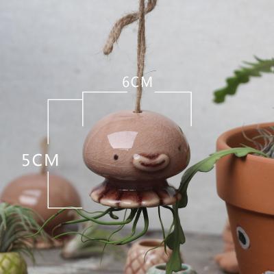 China Contemporary Home Decoration Pieces Lazy Flower Pots Hanging Planter Air Plant Floating Coiler With Best Quality for sale