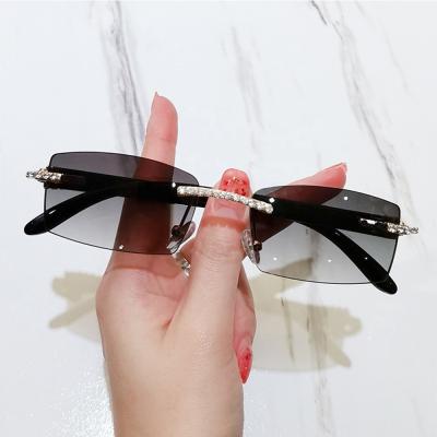 China Fashion Rimless Sunglasses Buffalo Horn Sunglasses Rimless Stone Square Shades Transparent Rectangle Sunglasses 2021 for sale