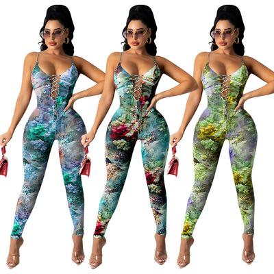 China Fashionable 2021 spring new long culottes flower print mesh strap bandage tie dye hollow cut one-piece jumpsuits for sale