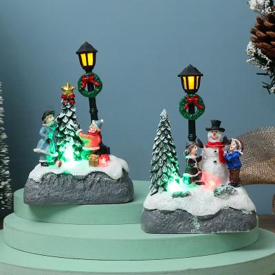 China 2022 Christmas Decoration Christmas Gift Resin Open Choir Snowman Santa With LED Light Lamp Post for sale