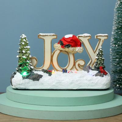 China Christmas Decoration Joyfull Style Christmas Ornament Resin Table Top Resin Christmas Village Houses 2022 New for sale