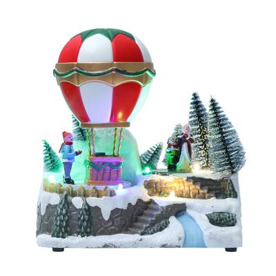 China 2022 Hot Creative Christmas Decoration Factory Outlet Art Santa On A Air Balloon Home Decoration Personality Resin Crystal Clear For Crafts Epoxy for sale