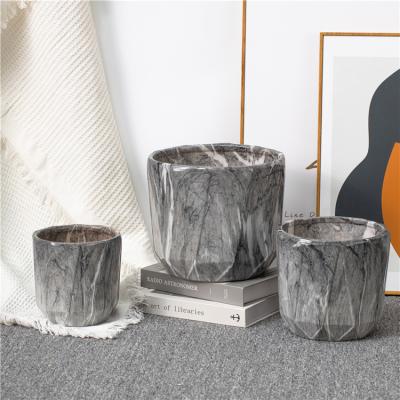 China Fashion eco-friendly Nordic home style potted plant table decorative single ceramic marble flower pot for sale