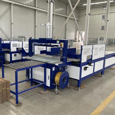 China Automatic Corrugated Box Packing Pallet Strapping Machine PP Belt Band Cardboard Box Pallet Strapping Machine for sale