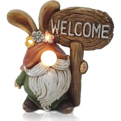 China North America Decorative Home Sculpture Polyresin Garden Gnome Decoration with LED Solar Light for sale