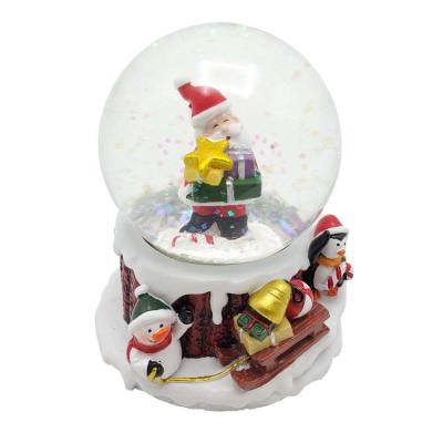 China North America Christmas Snowman Santa Claus Figurines Kids Polyresin Snowglobe Decoration for sale