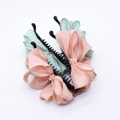 China Polyester 2021 hot sale fashion classic fabric bow flowers tie big big banana hair clip accessories fFor woman girls for sale