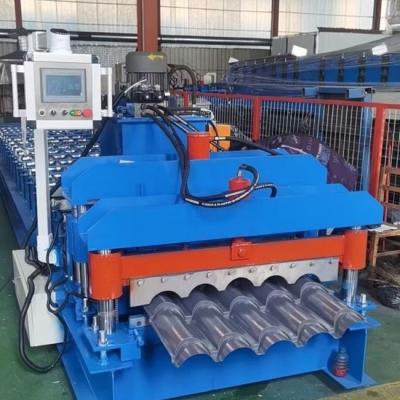 China Máquina de moldeado de láminas de techo galvanizadas de acero eléctrico 220V con corte hidráulico en venta