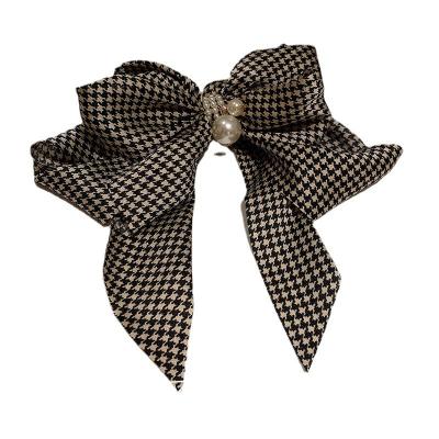 China 2022 hot sale Japanese grid Internet wear new big bow and Korean celebrity headdress hairpin hair accessories for sale