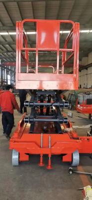 China 1200*1000mm Portable Small Lift Table Hydraulic Mini Mobile Scissor Lift Platform for sale