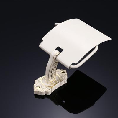 China Wholesale Modern Toilet Paper Holder Bathroom Easy To Clean European Style Ivory White Gold Pull Paper Roll Holder for sale