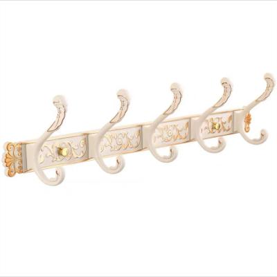 China Wholesale Nordic La Hook Gold Bathroom Living Room Kitchen Coat Hook Ivory White Stocked for sale