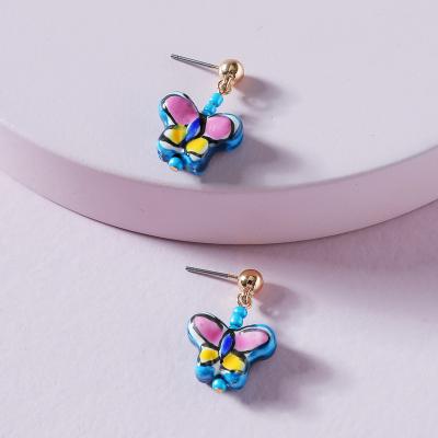 China TRENDY.Cute Fashionable Colorful Korean Earrings New Shape To 2021 Summer Kids Butterfly Stud Earrings Ceramic Jewelry for sale