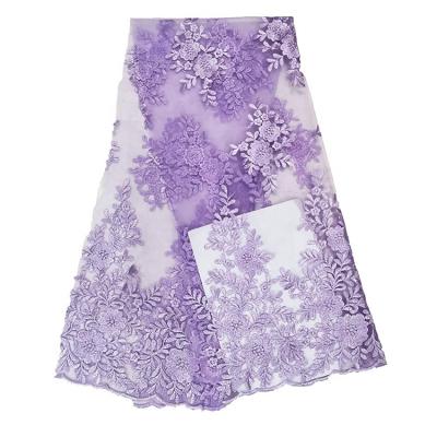 China Viable Factory Wholesale New Style Border Lace Fabric Customized Lavender Embroidered Lace Fabric For Dress for sale