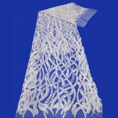 China Viable Lace Fabric Factory High Quality White Material Beaded Lace Fabric Wedding for sale