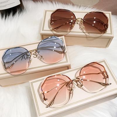 China Latest Fashion UV400 Anti Shading Women Oversized Rimless Diamond Cut Sunglasses for sale