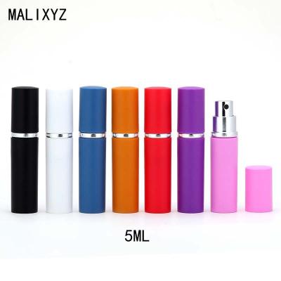 China Factory Newest 5ml Plastic Spray Perfume Bottle Fashionable Refillable Bottle Unique Design for sale