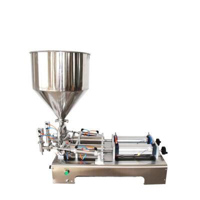 China YTK-G2WG Double Heads 100-1000ML Pneumatic Food Piston Cream Honey Paste Filling Machine for sale