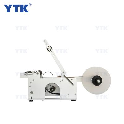 China YTK-50 semi-automatic food labeler for round bottle labeling machine/beer bottle labeling machine for sale