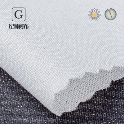 China Adhesive Polyester Woven Fusible Interlining Water Spray Loom Interlining for sale