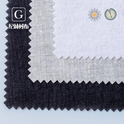 China Colored Polyester Interlining Fabric Anti-Static / Water Soluble Shrink-Resistant Waist Liner Cotton Lining for sale