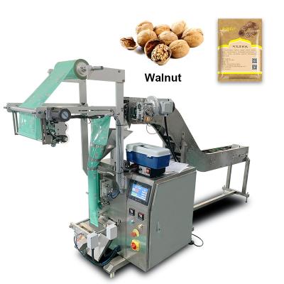 China Semi-automatic Sunflower Melon Seeds Biscuit Small Food Nuts Granule Packing Machine for sale