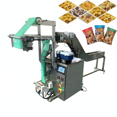 China Semi Automatic CLOTHING Chain Bucket Pellet Snacks Jelly Chips Filling Gasket Pad Machine for sale