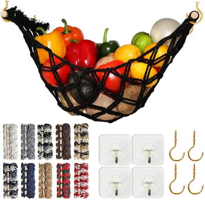 China Sustainable Boho Fruit Hammock With Wooden Fingers Hanging Fruit Storage Net Under Cabinet Hot Sale Handmade Amazon Macrame Fruit Hammock for sale