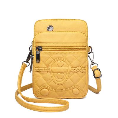 China Hot music fashion candy color cross - body chest bags ladies small sling cross - body bags single shoulder cell phone bag for sale