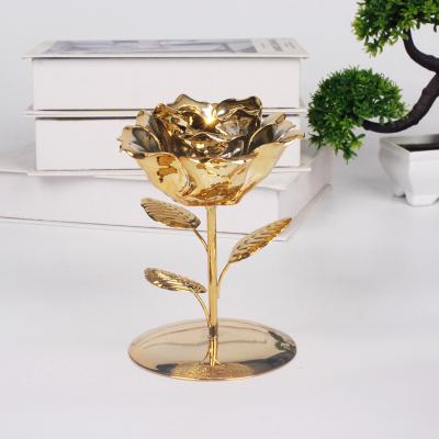 China Wholesale Fashion Minimalist Christmas Day Gold And Silver Ceramic Flower Shape Candle Holder For Table Luxury Home Wedding Decoration for sale