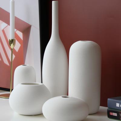 China Nordic minimalist home popular modern simple style vase china decor white ceramic flower vase for wedding table decoration for sale