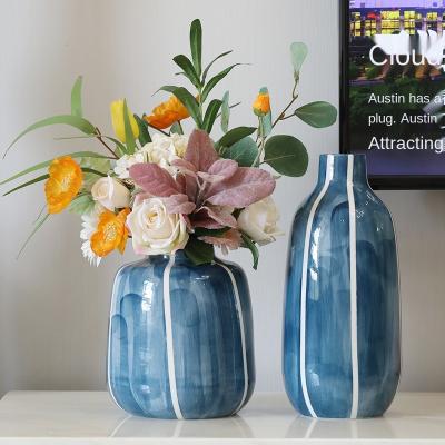 China Creativity Minimalist Modern Nordic Design Blue Ceramic Flower Vase For Home Decor Dry Flower Container Office Living Room Ornament for sale