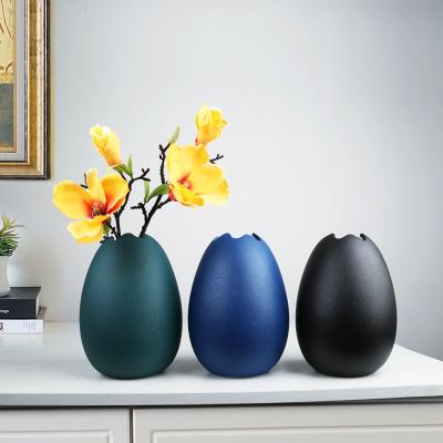 China Spring Minimalist Easter Eggs Shaped Art Vase Fresh Flower Vase Minimalist Ceramic Dry Floor Decorative Flower Vases for sale