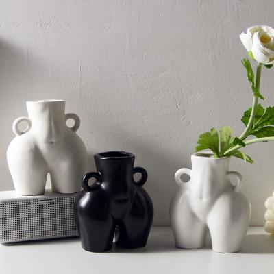 China Wholesale Minimalist Cheap Handcrafted Black And White Ceramic Vases Art Donkey Body Tabletop Vase For Hotel Home Decor Porcelain Flower Pot for sale