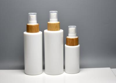 China 40ml 100ml 120ml Opaque White Glass Lotion Bottle With Bamboo Real Wood Mist Spray, Primary Fragrance Spray Bottles for sale