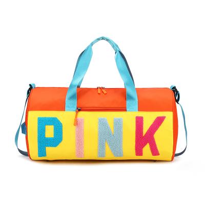 China Fashionable pink duffel bag for women multifunctional fashion weekender bag men travel duffel bag with travel accessories for sale