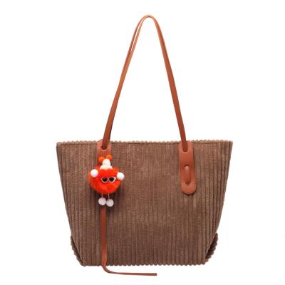 China Portable Hot Selling Grain Women Handbag Candy Color Luxury Tote Handbags Large Capacity Striped Shoulder Bag for sale