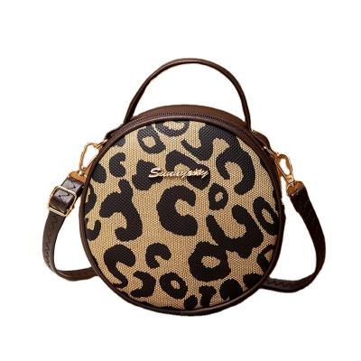 China Durable Leopard Printing Single-shoulder Small Casual Mobile Phone Clips Round Women Handbags for sale