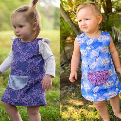 China Custom Anti-wrinkle Babies Sewing Pattern One Line Dress Size 0-3 Months To 3T Front Pocket Print Flower Cute Infant Girl Dresses for sale