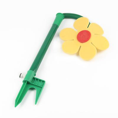 China Cheap Garden Farm Irrigation Lawn Flower Sprinkler Funny Dancing Lawn Sprinkler With Plastic Spike for sale