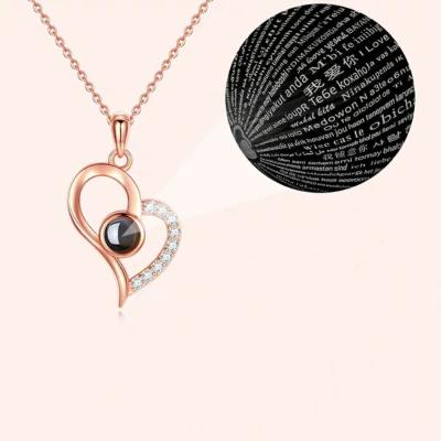 China Good 100 I Love You Languages ​​Projection Heart Shaped Pendant Necklace Memory Jewelry Romantic Necklace for sale