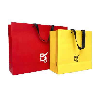 China Recyclable Paper Bag Custom Boutique Quality Logo High Quality Packaging Shopping Bag For Clothing Business Promotion Exhibition for sale