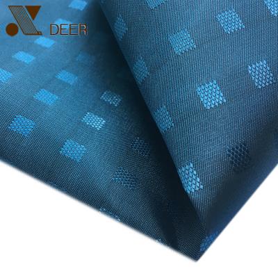 China Shrink-Resistant 100% Polyester Woevn Black Yarn Shinny Dobby Suit Lining For India Market for sale