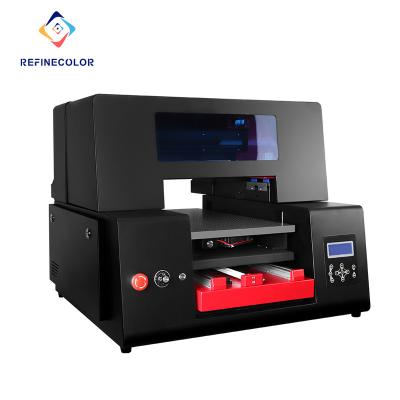 China Hotels Refinecolor Low Cost A3 DTF UV Printer CMYKW Varnish UV Inks Direct Printing A-B PET Film Impresora 3D For Bottle ABS Helmet for sale