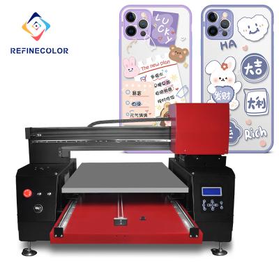 China Plastic Refinecolor Available in All Machine 6090 UV Flatbed Printer UV Colors Printing with XP600 Three Printhead for sale