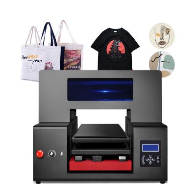 China Good quality cotton t-shirt printing machine hoodies fabric printing machine shop price a1 uv flatbed printer for sale