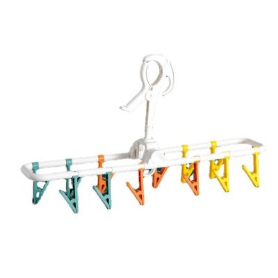 China Traditional Multifunctional Plastic Portable Space Saving Clothes Hangers Plastic Sock Hangers for Socks with 12 Clips for sale