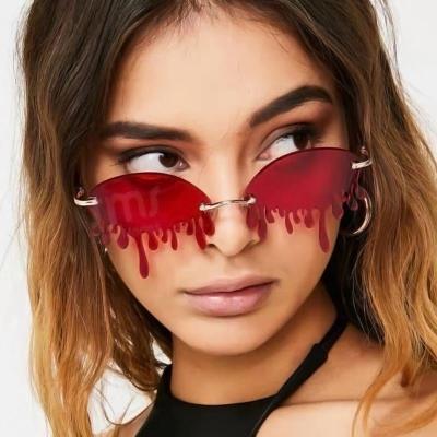 China Unique Fashion DAISYER Sunglasses Fashion Design Drop Tears Frame Luxury Rimless Women Girls Sun Glasses Designer Rimless Sunglasses for sale