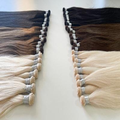 China Hot Selling Solid Color Virgin Hair Seamless Extensions Silky Straight Full Wave Shine Hand Tied Weft for sale