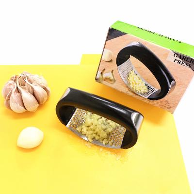 China Kitchen 430 Stainless Steel Hand Pressed Ginger Chopper Sustainable Garlic Presses Quality Fresh Garlic Presses for sale